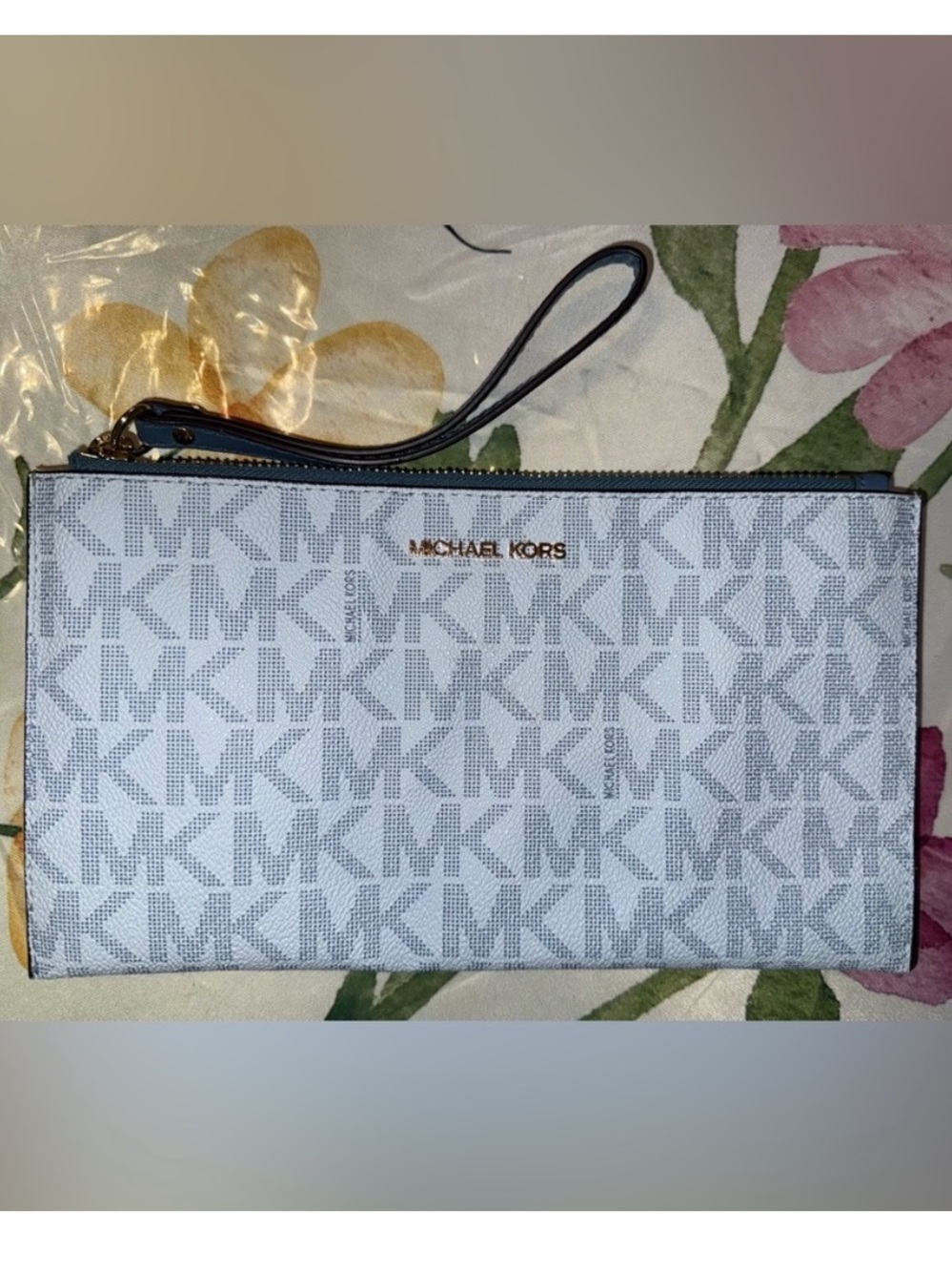 Excellent condition Michael Kors jet set blue and Gray Logo Wristlet Pouch
